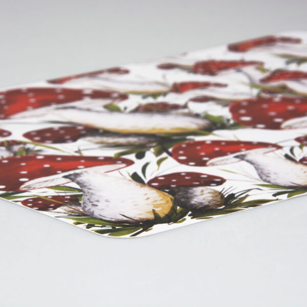 Placemat decorated with red mushrooms