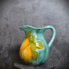 Pitcher with lemons