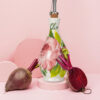 bottiglia-olio-rose-piccola-ambientata-inverno Olive oil ceramic jar roses 250 ml