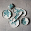 polpo-mix-fondo-cemento Appetiser tray with octopus