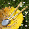 Salad set with yellow daisies