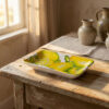 vaschetta-limoni-rilievo-ambientata-ok-1 Rectangular ceramic bowl decorated with embossed lemons